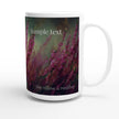 Person holding floral mug with steam in cozy setting