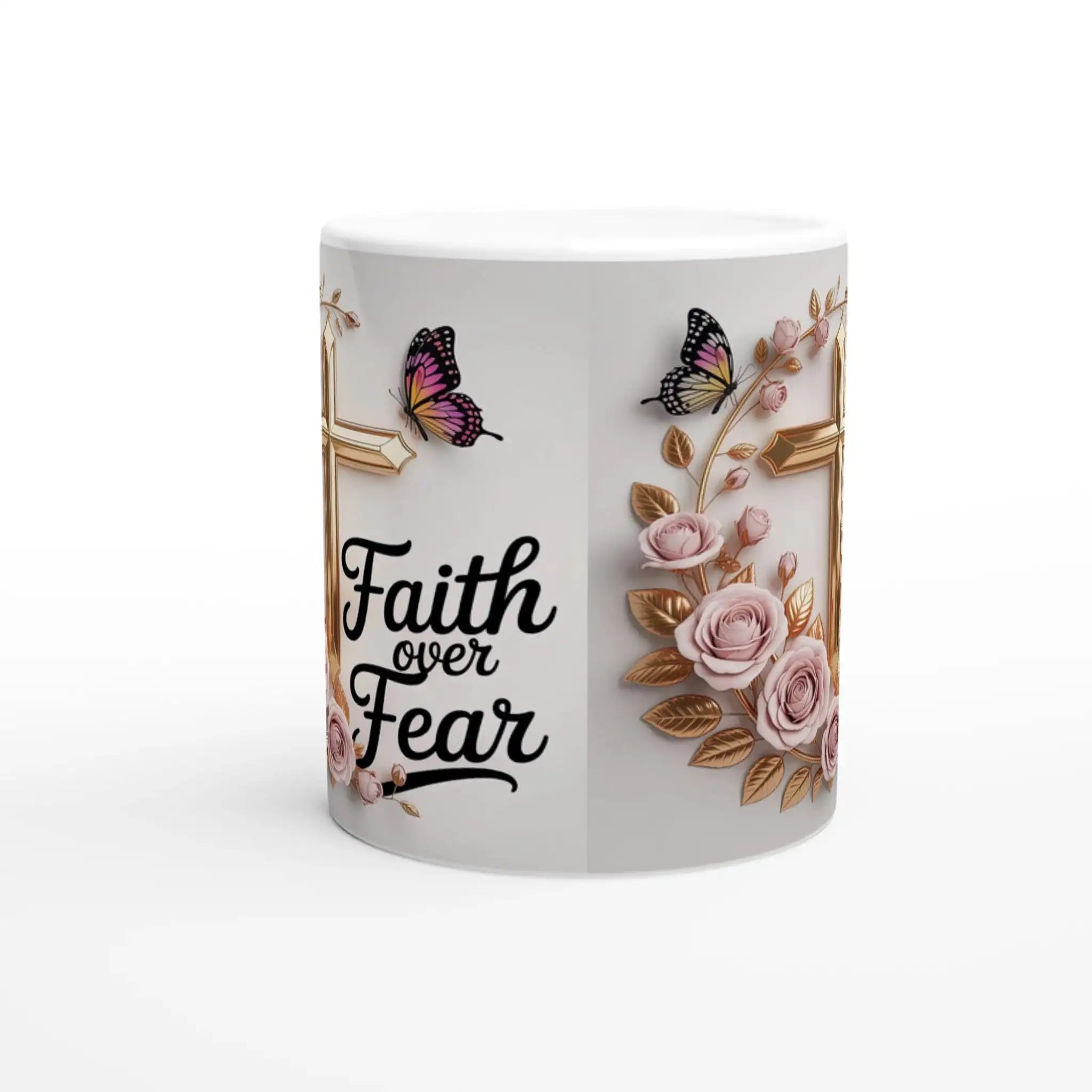 Ceramic mug with faith design, pink roses, butterflies, and gold cross, on a wooden table with plants and sunlight