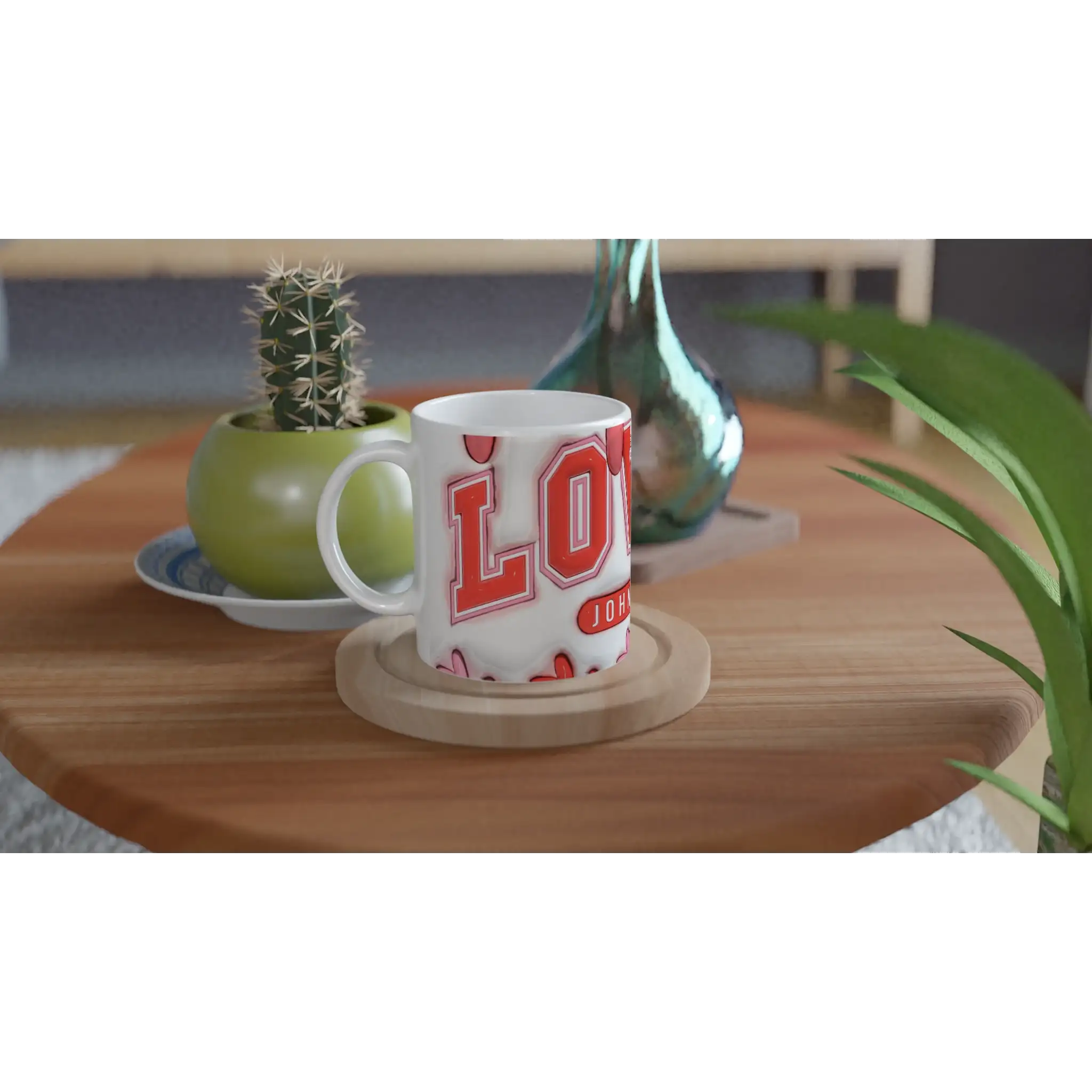 White mug with red lettering on wooden table