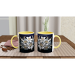 Ceramic mug with floral design and blue handle
