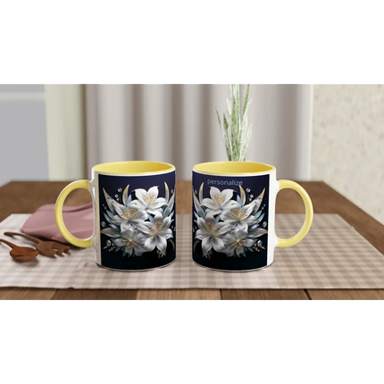 Ceramic mug with floral design and blue handle
